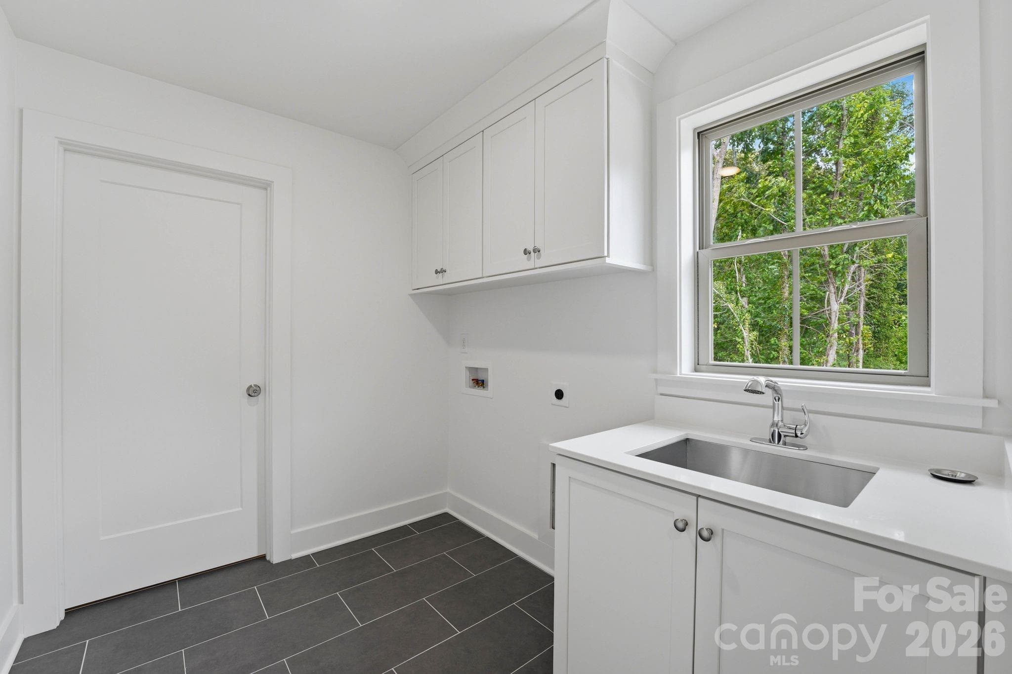 Laundry room. - 2315 Chateau Court, Matthews