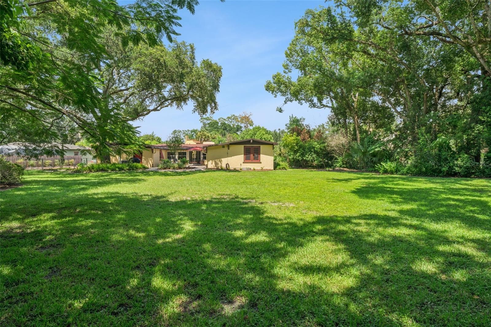 West/Rear Facade and Park-like Backyard - 497 VALENCIA ST, SANFORD
