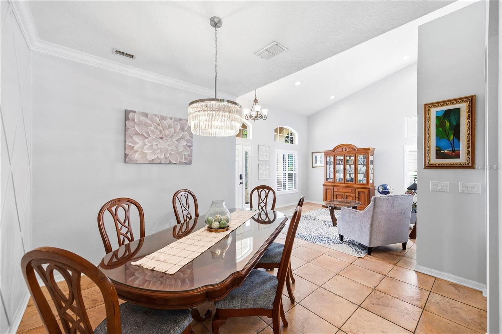 Modern crystal chandelier. - 11507 BELLE HAVEN DR, NEW PORT RICHEY