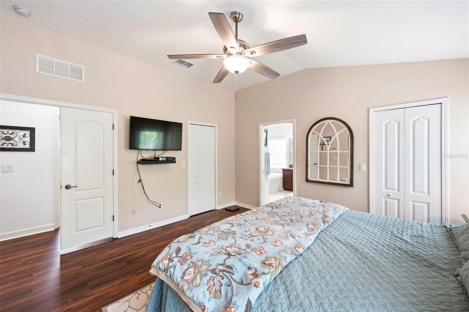 Dual walk-in closets in primary bedroom. - 11507 BELLE HAVEN DR, NEW PORT RICHEY