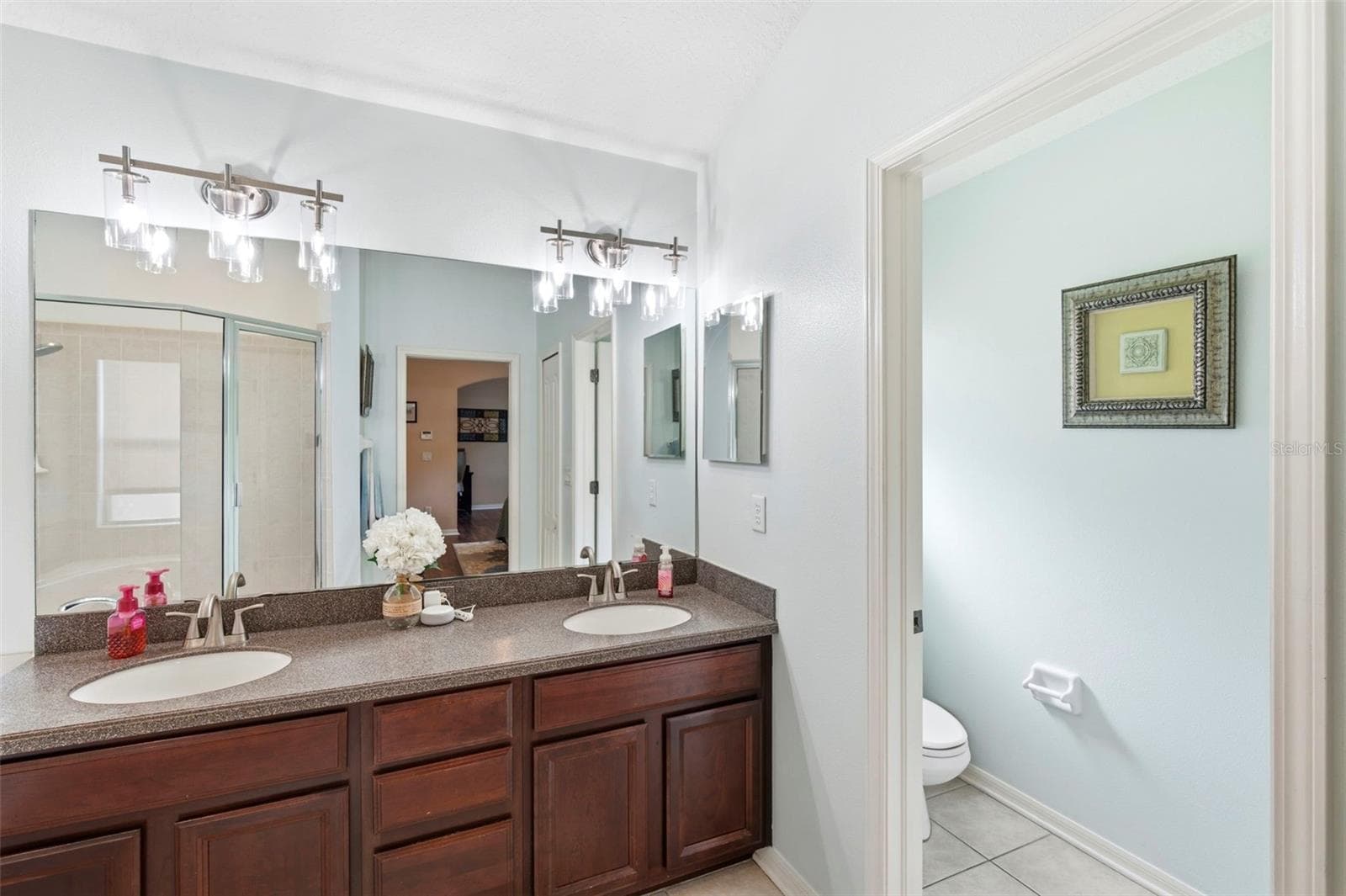 Dual sinks & private toilet room. - 11507 BELLE HAVEN DR, NEW PORT RICHEY