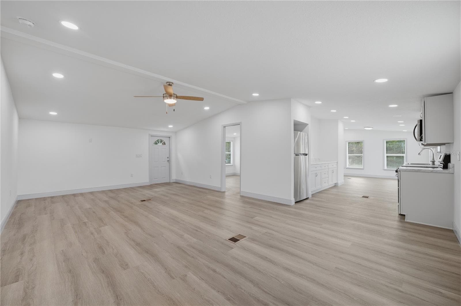 spacious living room - 7904 CADILLAC AVE, HUDSON