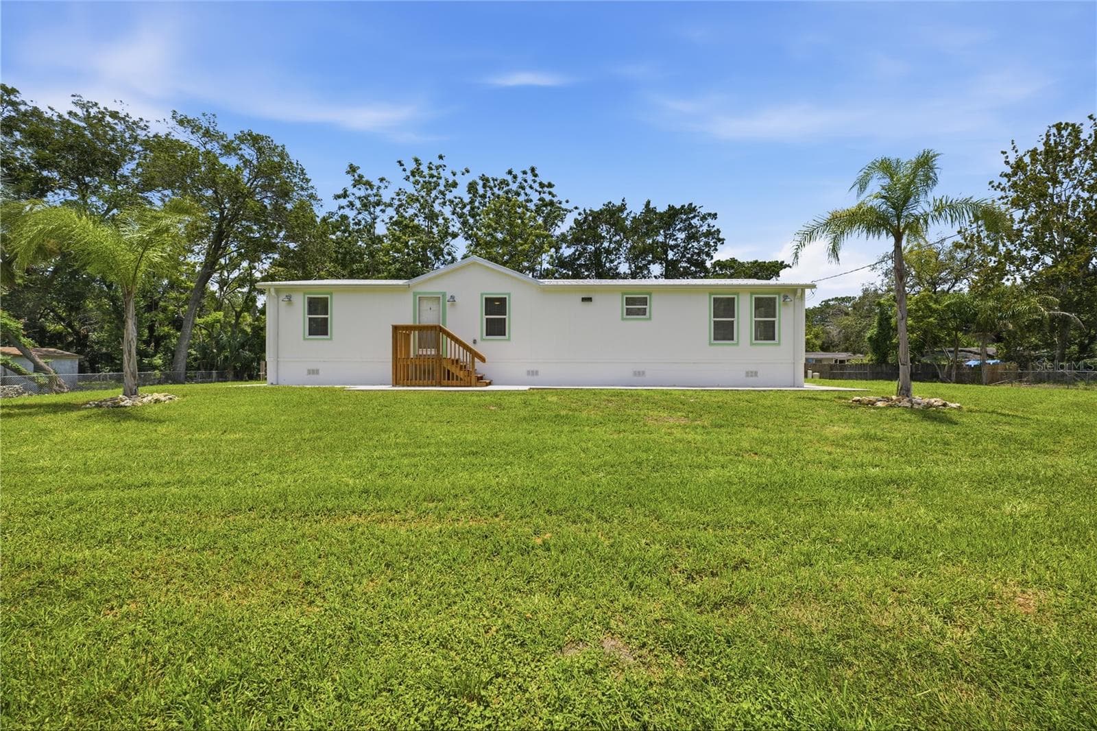 fully fenced in yard - 7904 CADILLAC AVE, HUDSON