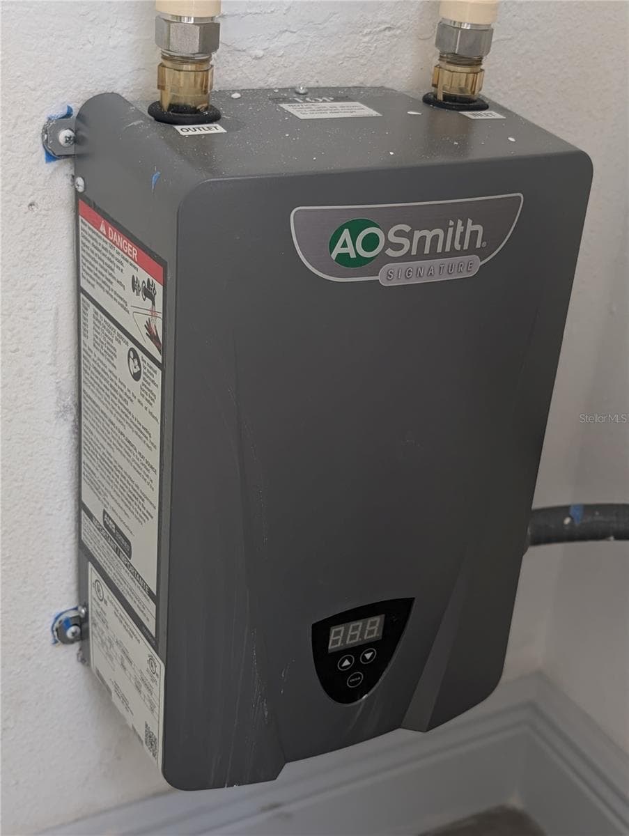 Tankless water heater - 7904 CADILLAC AVE, HUDSON