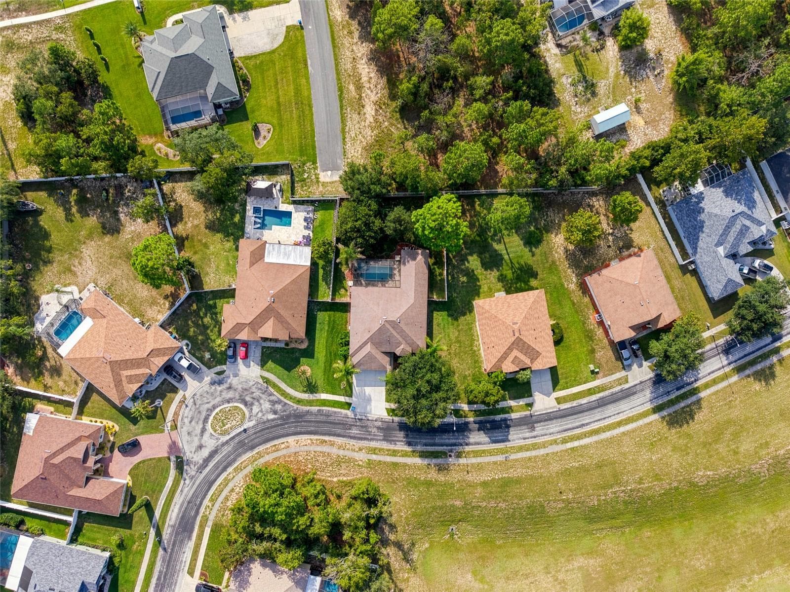 Larger backyard in Sterling Hill - No House  directly in front of property. - 5517 GREYSTONE DR, SPRING HILL