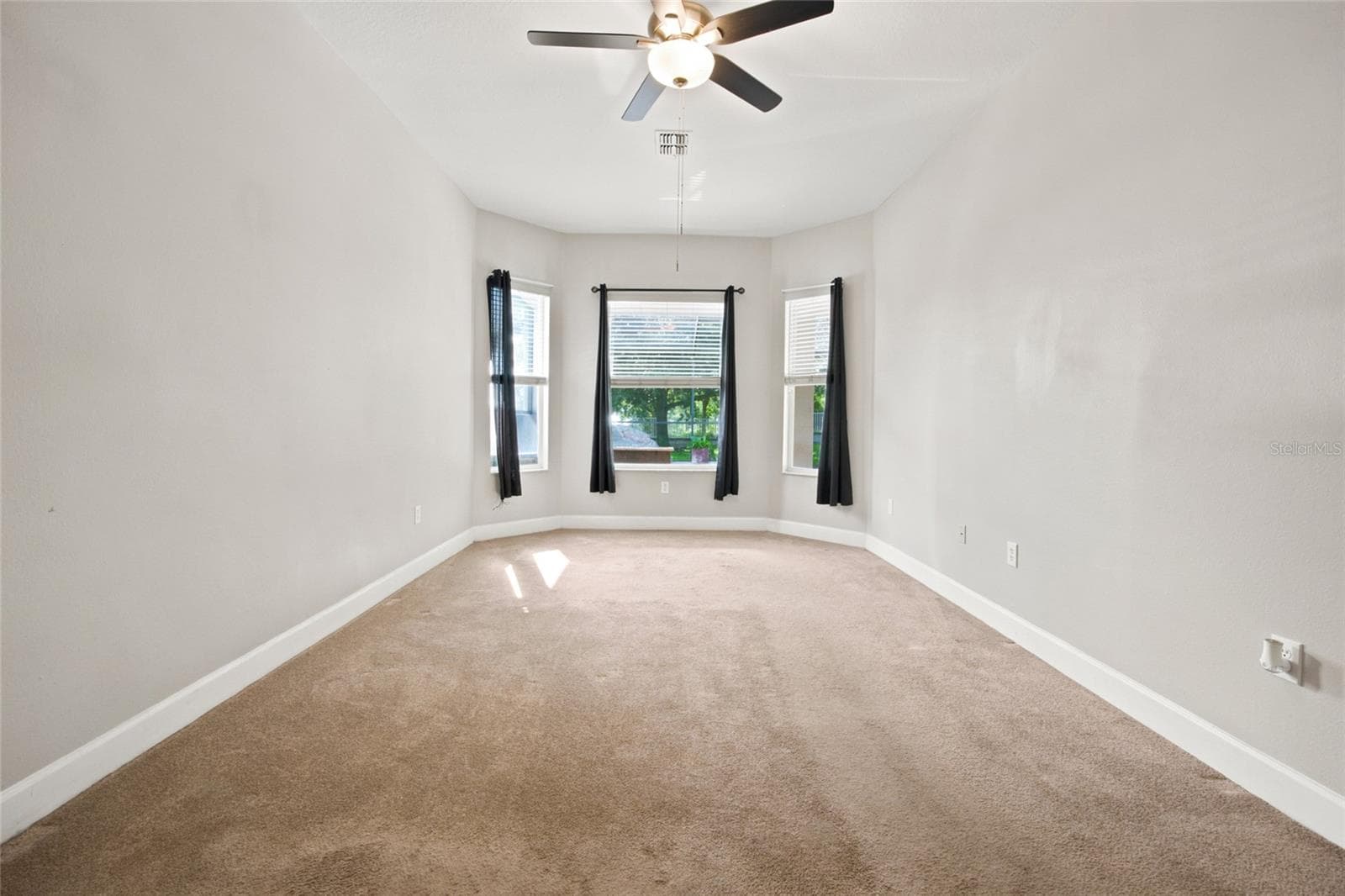 Primary Bedroom Overlooks Pool - 5517 GREYSTONE DR, SPRING HILL