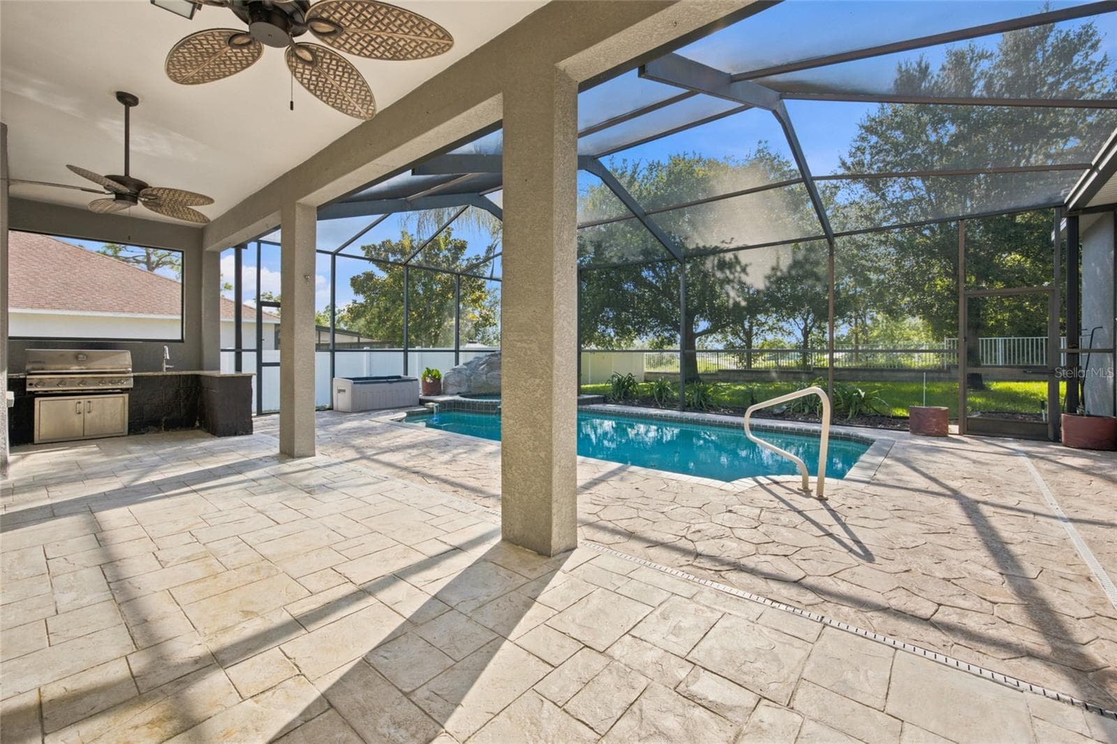 Large Covered Lanai with Outdoor Fans & BBQ Area - 5517 GREYSTONE DR, SPRING HILL