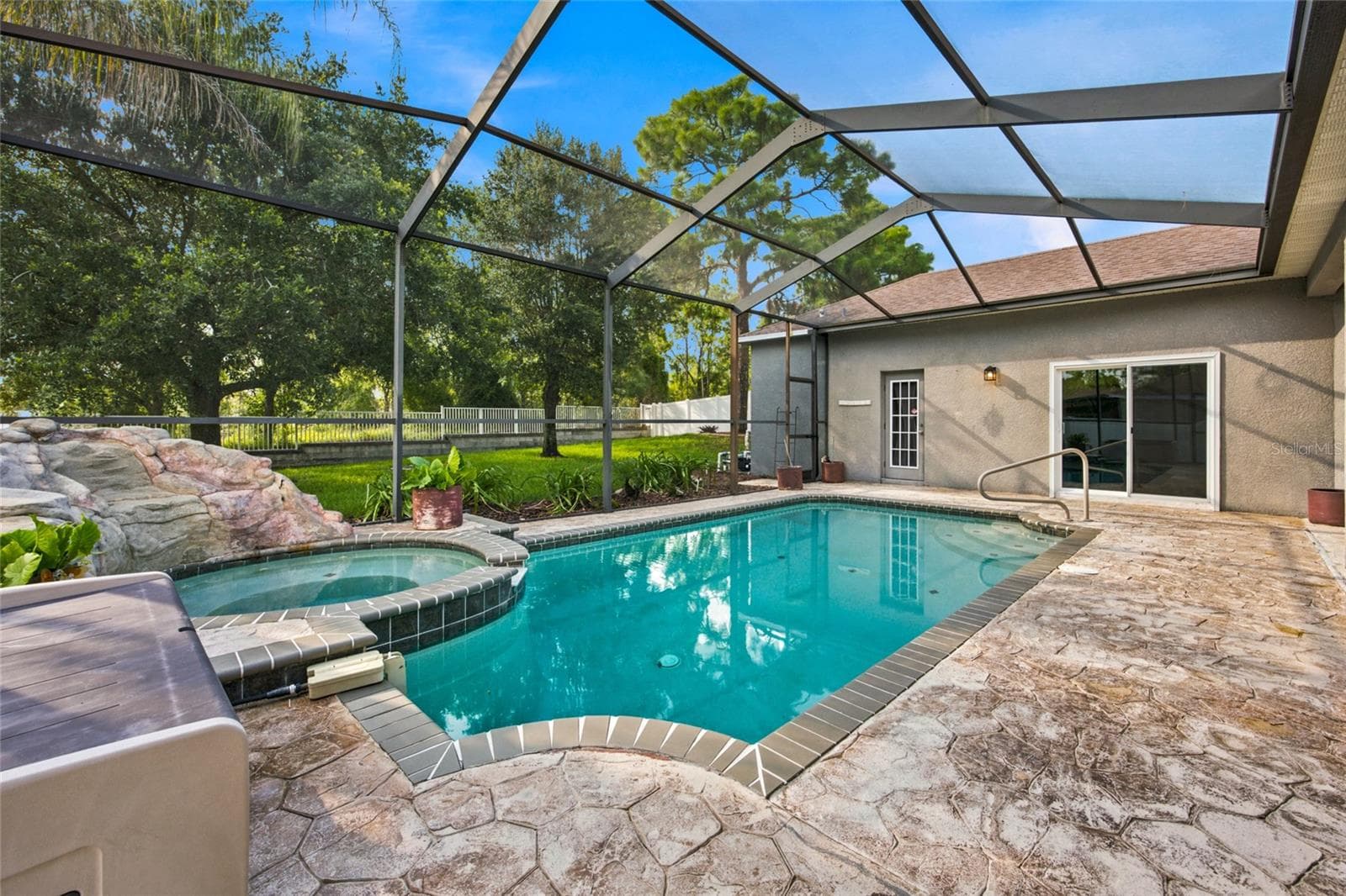 Pool view from BBQ Area - 5517 GREYSTONE DR, SPRING HILL