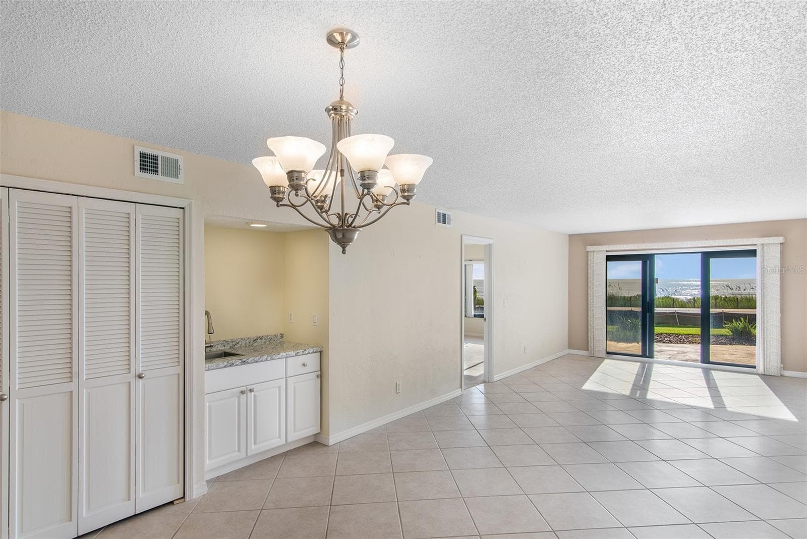 Dining/Living area - 2600 OCEAN SHORE BLVD #111, ORMOND BEACH