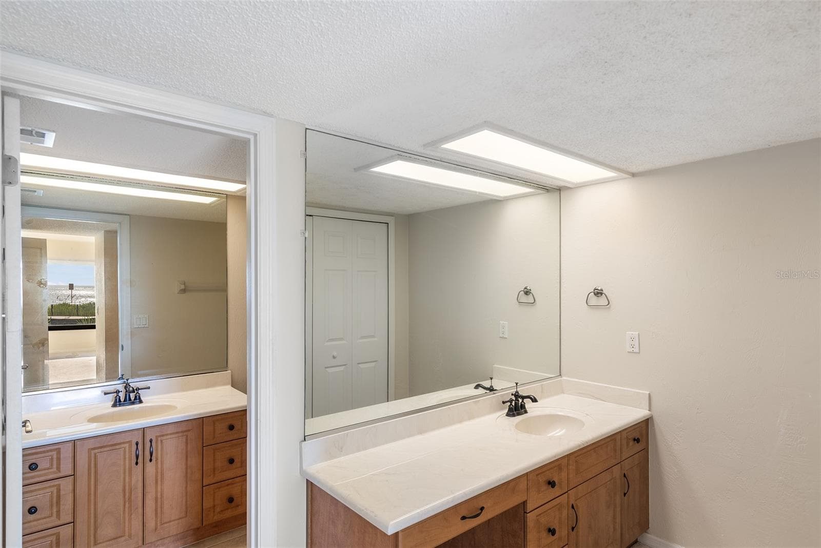 Primary bath dressing area - 2600 OCEAN SHORE BLVD #111, ORMOND BEACH