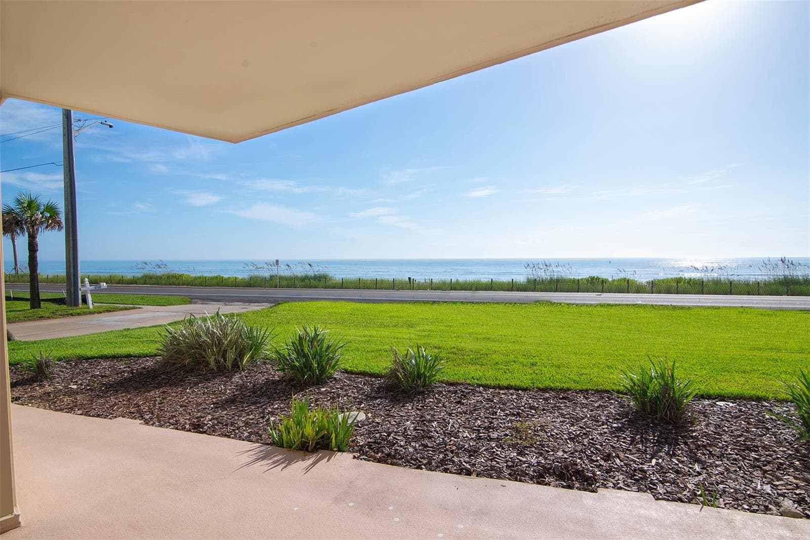 View from patio - 2600 OCEAN SHORE BLVD #111, ORMOND BEACH
