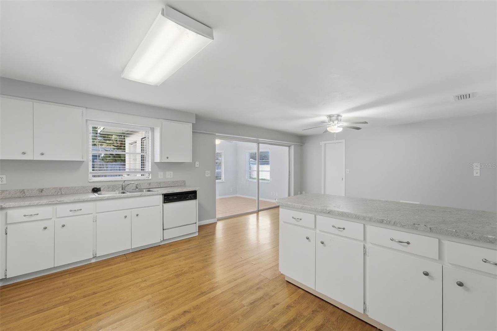Kitchen and entrance to bonus room - 1387 BELLEVUE BLVD, CLEARWATER