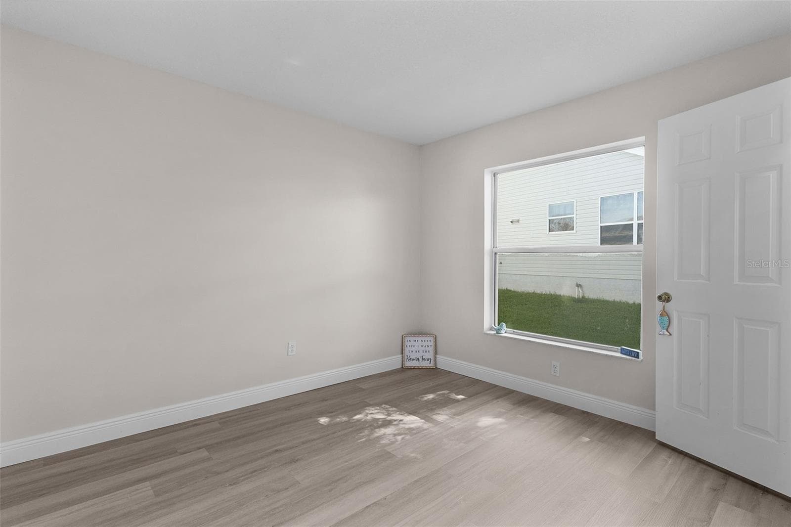 Guest bedroom two with walk-in closet. - 1012 DIEGO CT, LADY LAKE