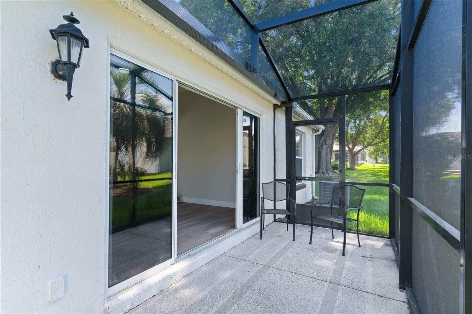 Relax out back with your pet and no pests. - 1012 DIEGO CT, LADY LAKE