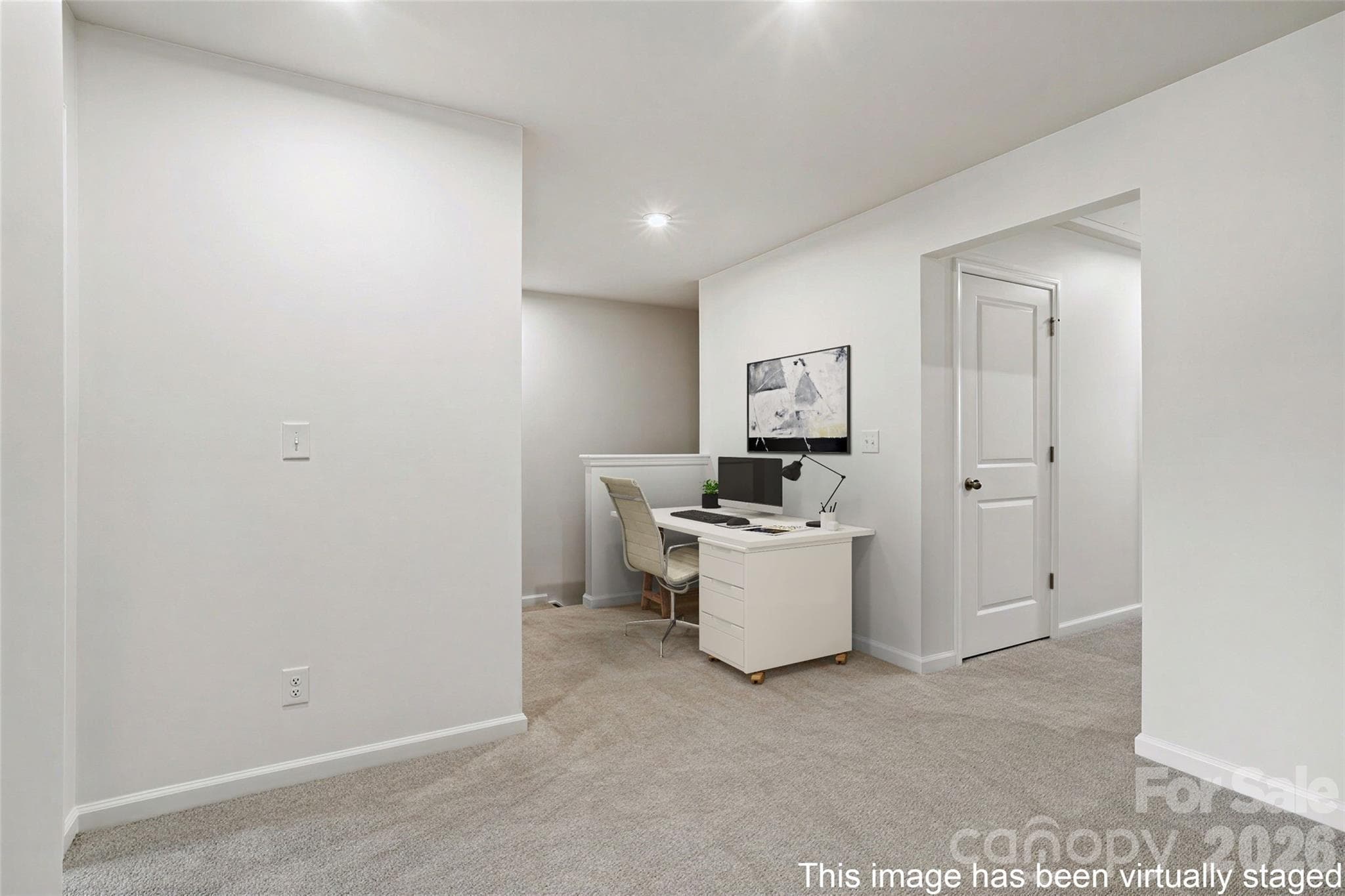 Virtual staged area in the upstairs loft. This floorplan allows for a desk or sitting area. - 608 Cassidy Court, Clover