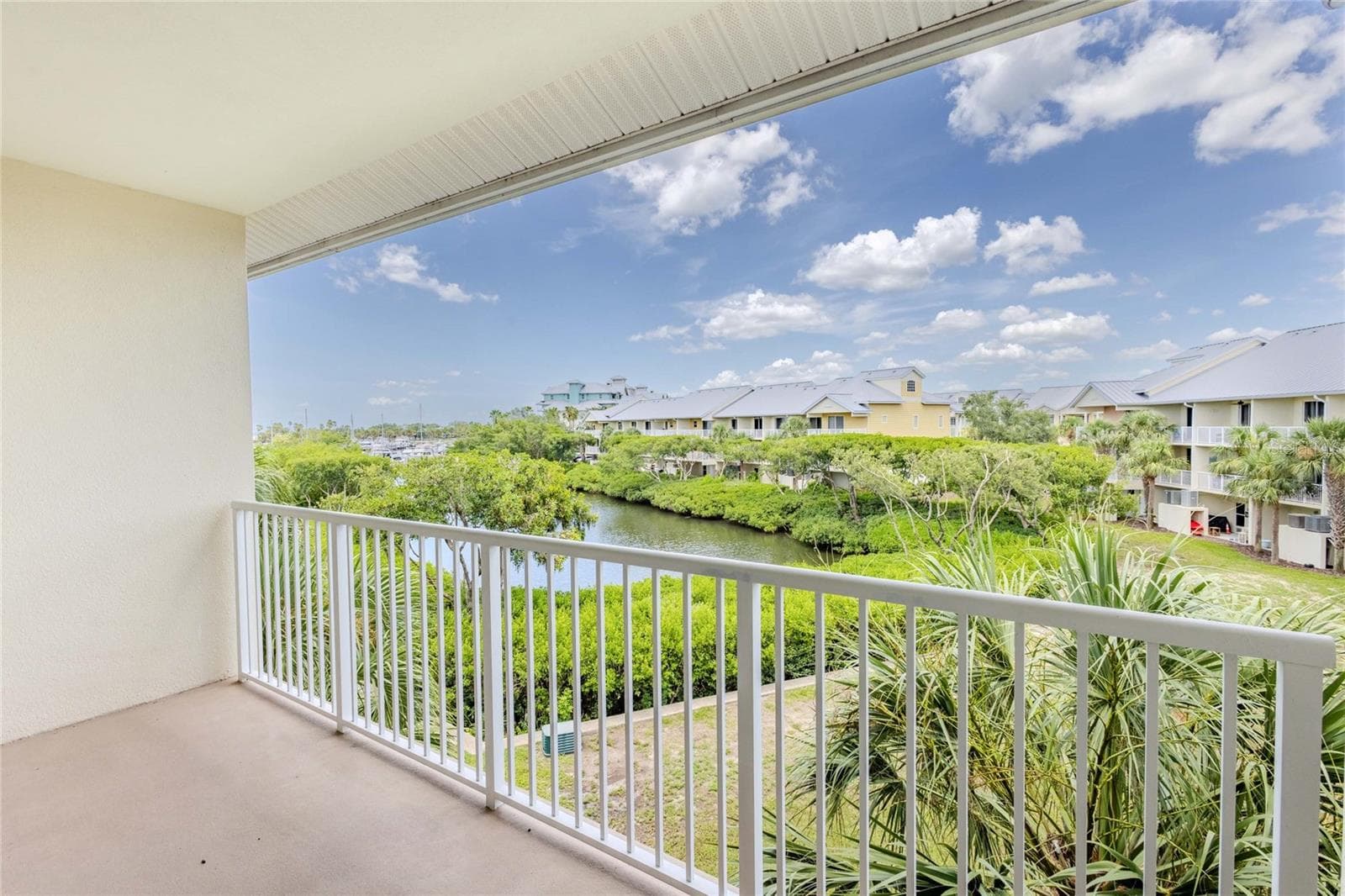 Primary Bedroom Private Balcony with Canal and Marina View - 3259 MANGROVE POINT DR, RUSKIN
