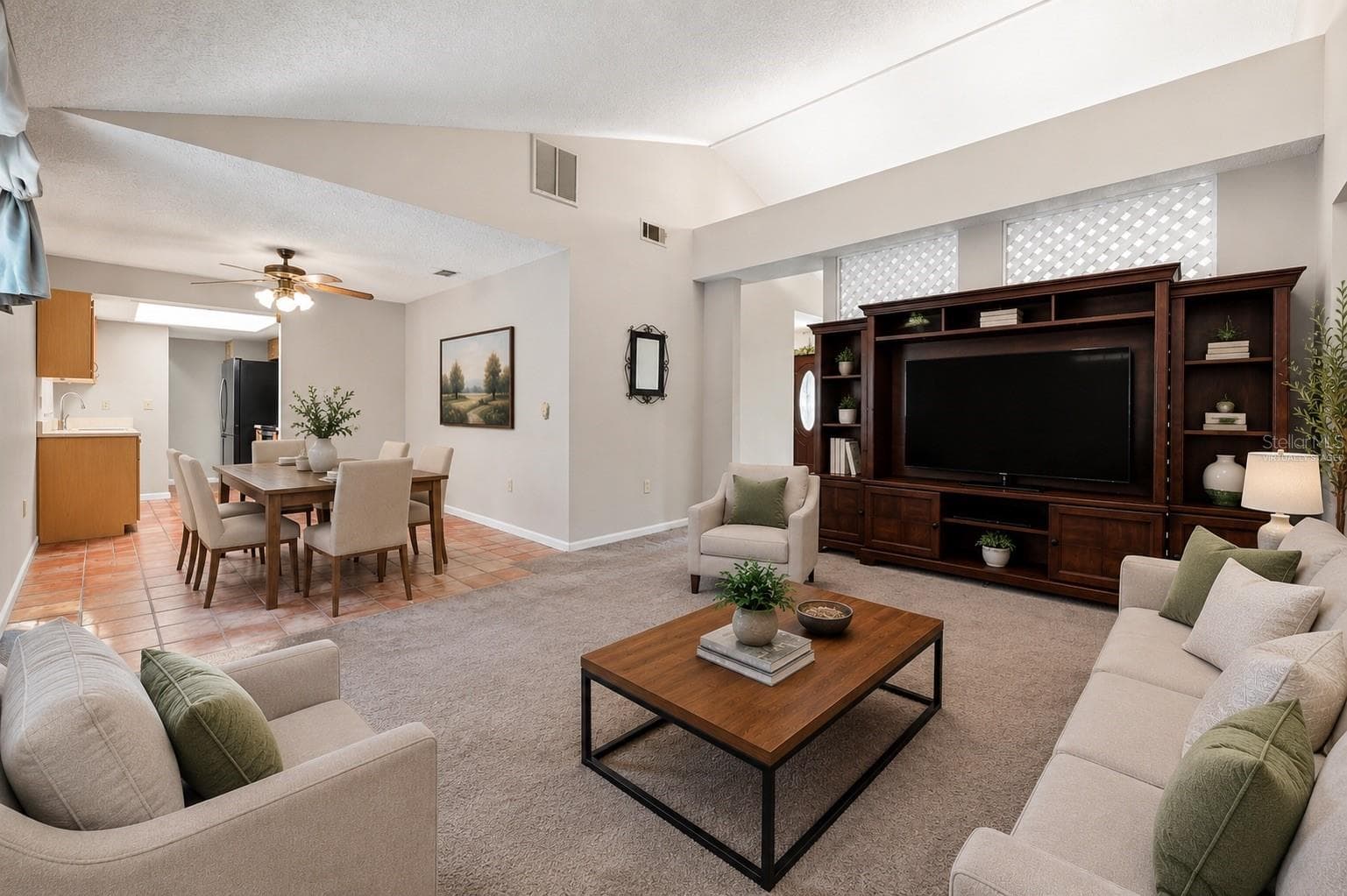 Virtually Staged - Family Room - open up to dining room. - 7316 HIGHLAND GROVE DR, LAKELAND