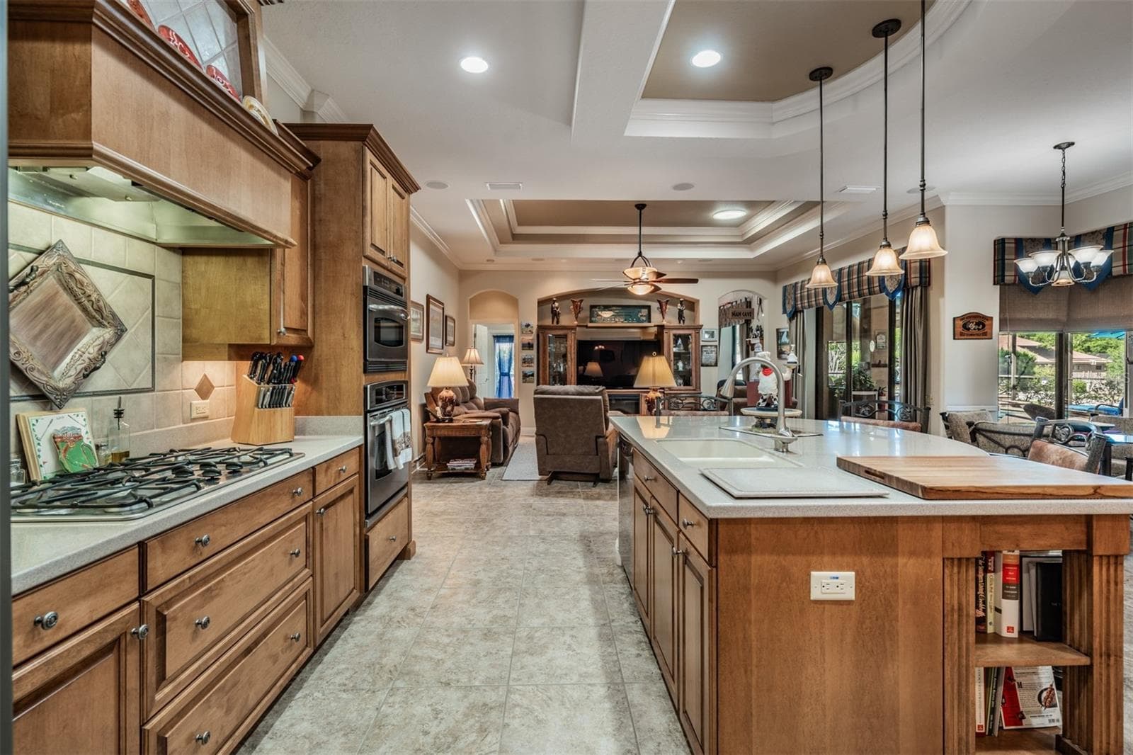 Wood cabinets with vent hood and center island - 34115 AMERICANA AVE, DADE CITY
