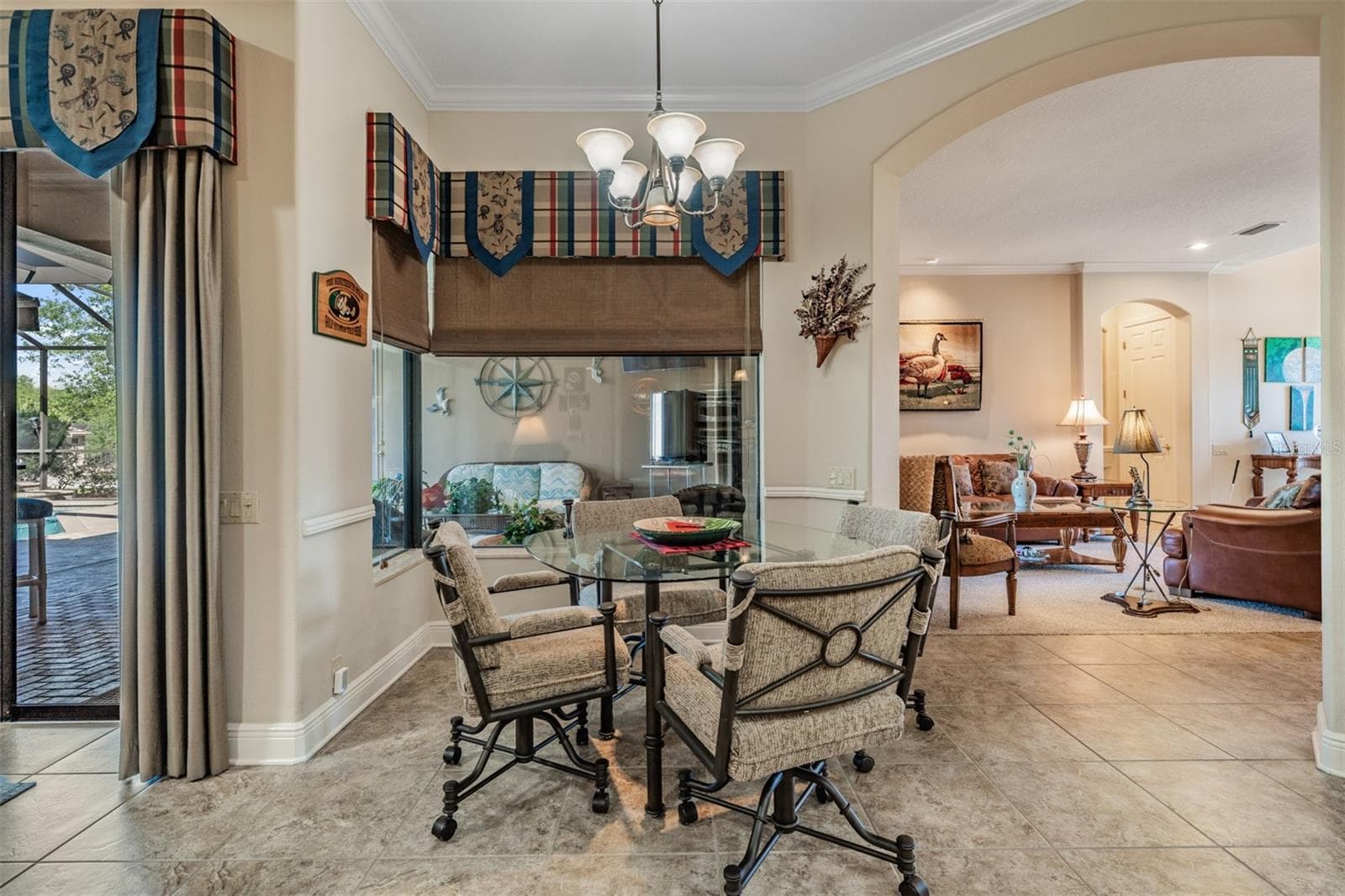 Crown molding throughout with custom window treatments - 34115 AMERICANA AVE, DADE CITY