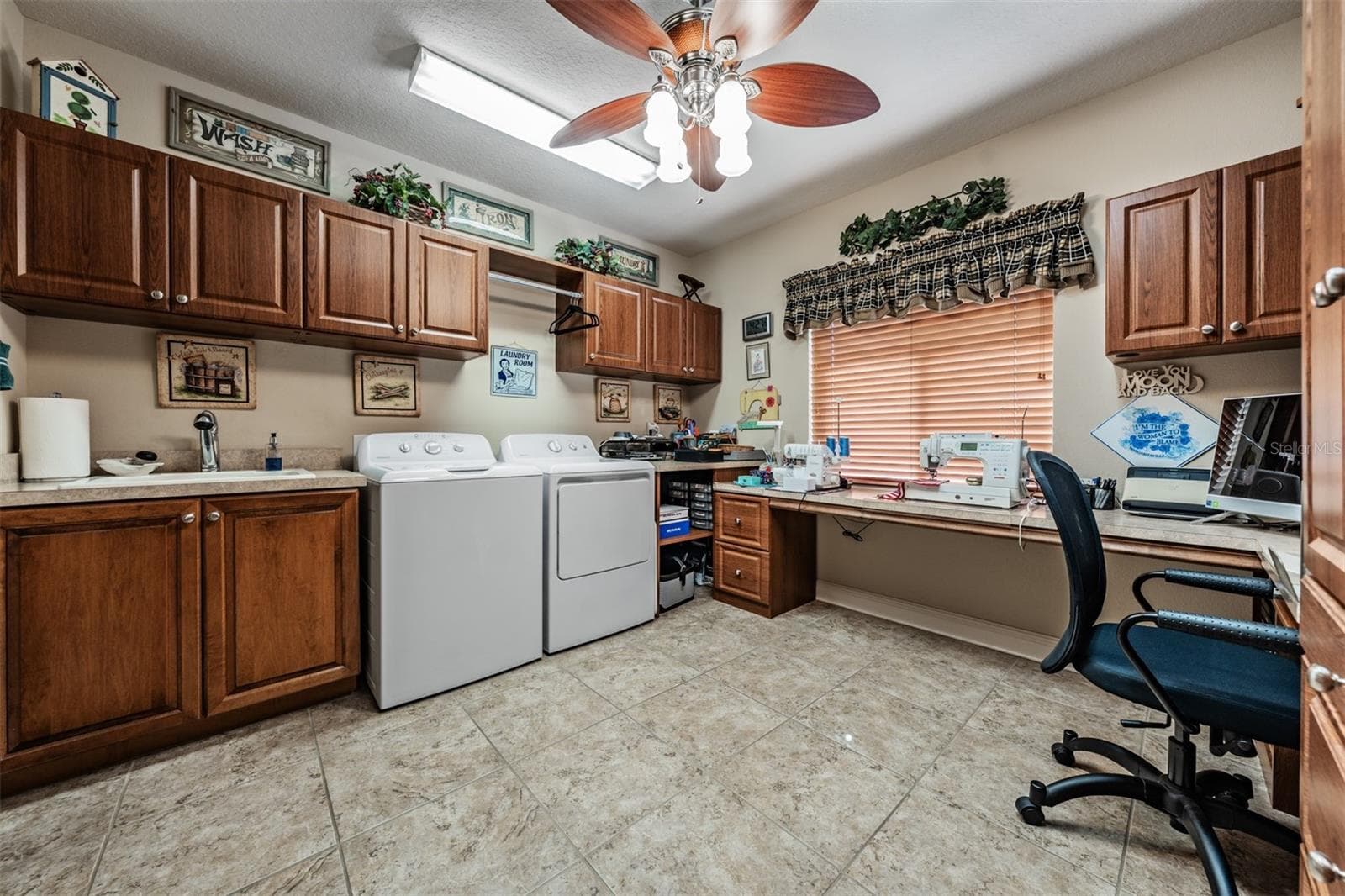 Shes gonna love this hobby/sewing/laundry/office room! - 34115 AMERICANA AVE, DADE CITY