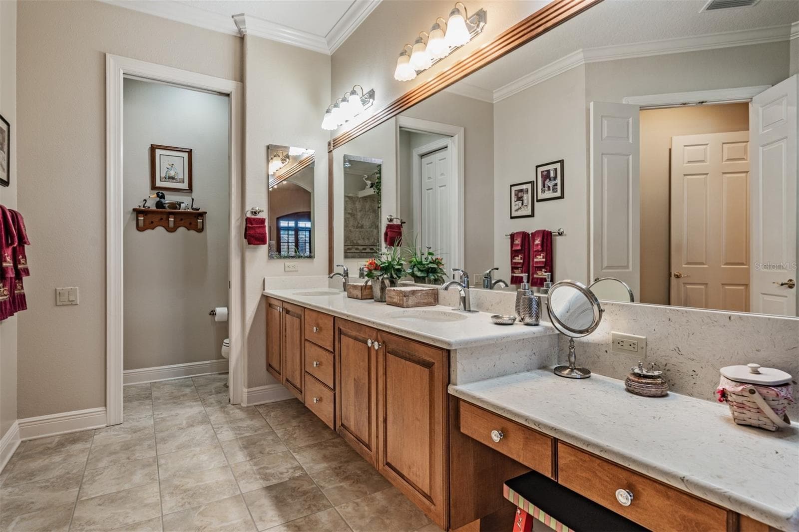 Private Water closet plusDual sinks & vanity area - 34115 AMERICANA AVE, DADE CITY