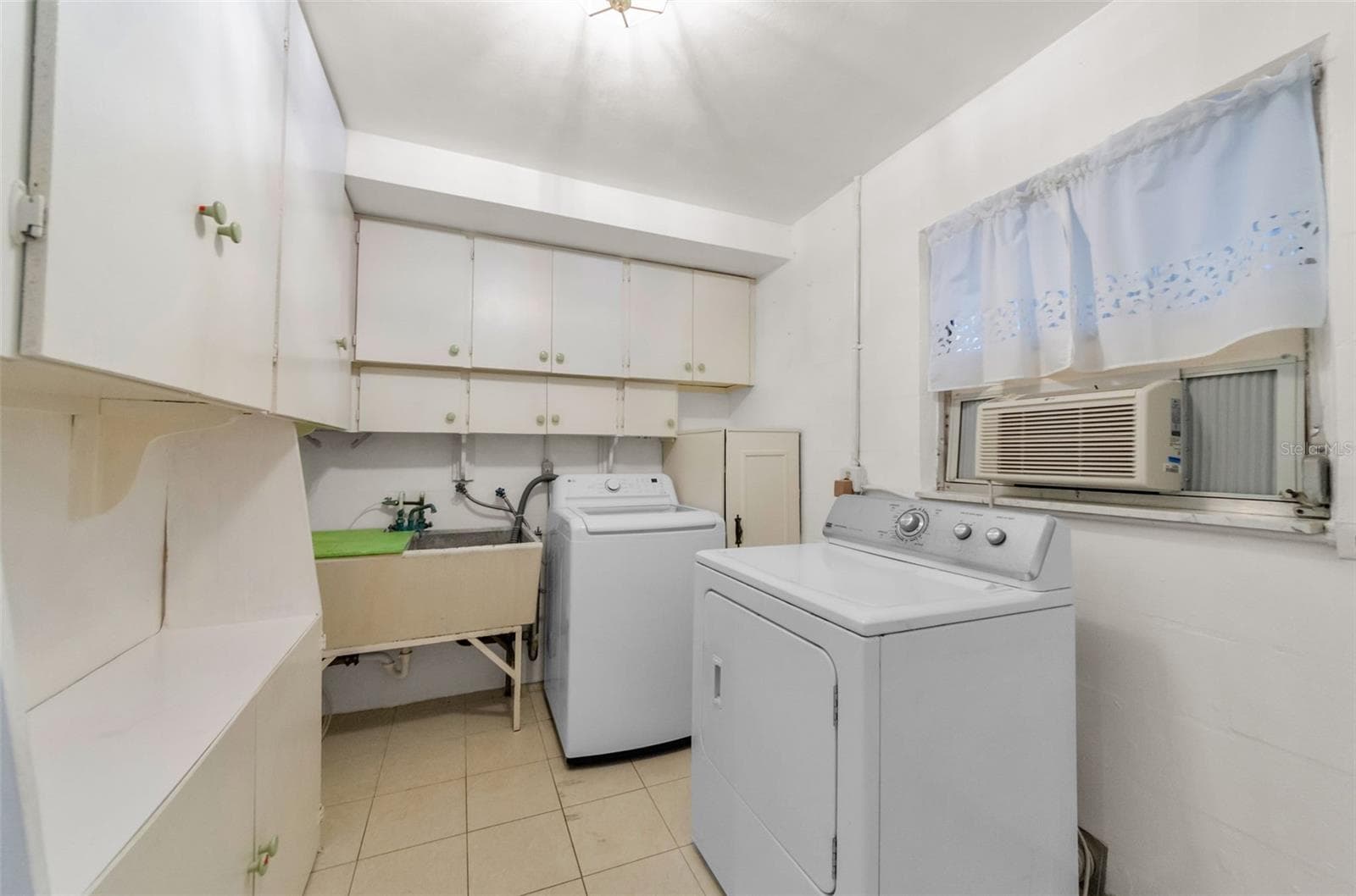 laundry room - 5992 32ND AVE N, ST PETERSBURG