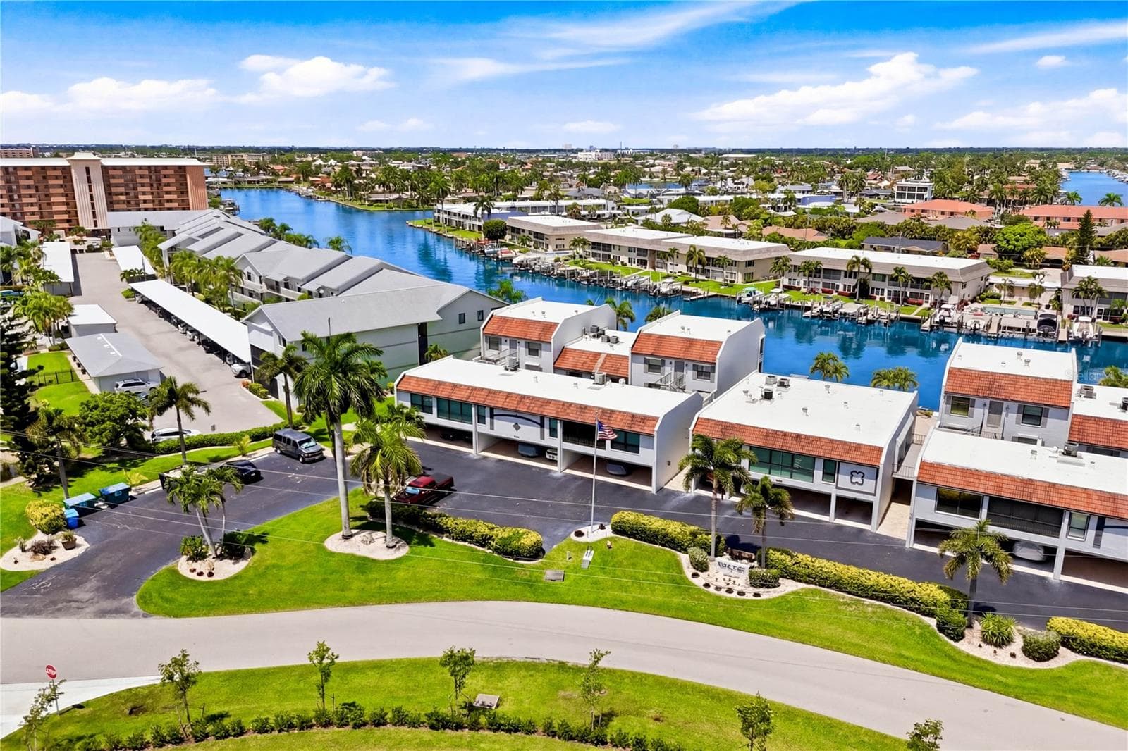 Additional highlights include MANUAL HURRICANE SHUTTERS for added protection, NEUTRAL INTERIOR COLORS, A/C (2018), WATER HEATER (2017), MOVE-IN READY condition, and NO PETS ALLOWED. - 4218 SE 20TH PL #D5, CAPE CORAL