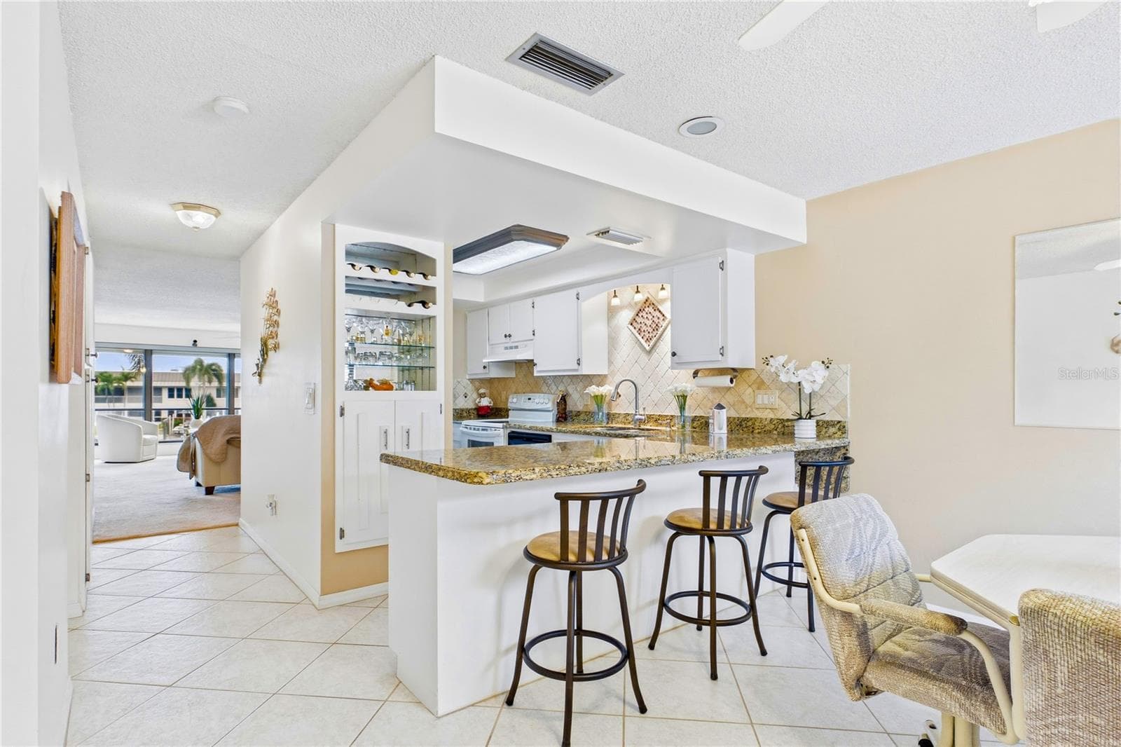 Spacious kitchen with seating area - 4218 SE 20TH PL #D5, CAPE CORAL