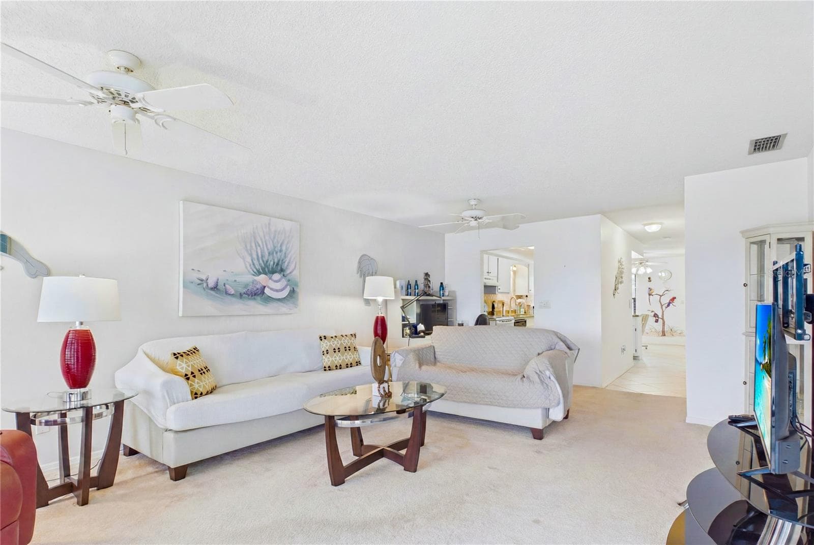 The generous layout offers flexible space for lounging, entertaining, or a home office setup - 4218 SE 20TH PL #D5, CAPE CORAL