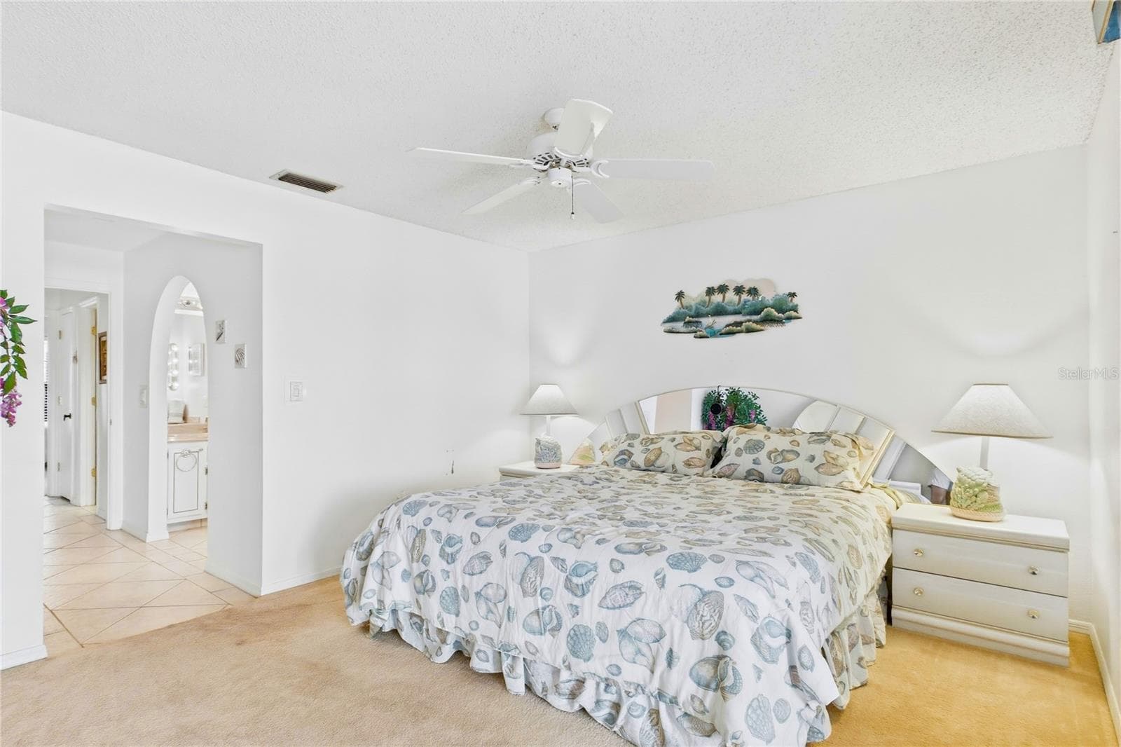 Spacious primary bedroom with room to unwind and a peaceful, airy feel. - 4218 SE 20TH PL #D5, CAPE CORAL