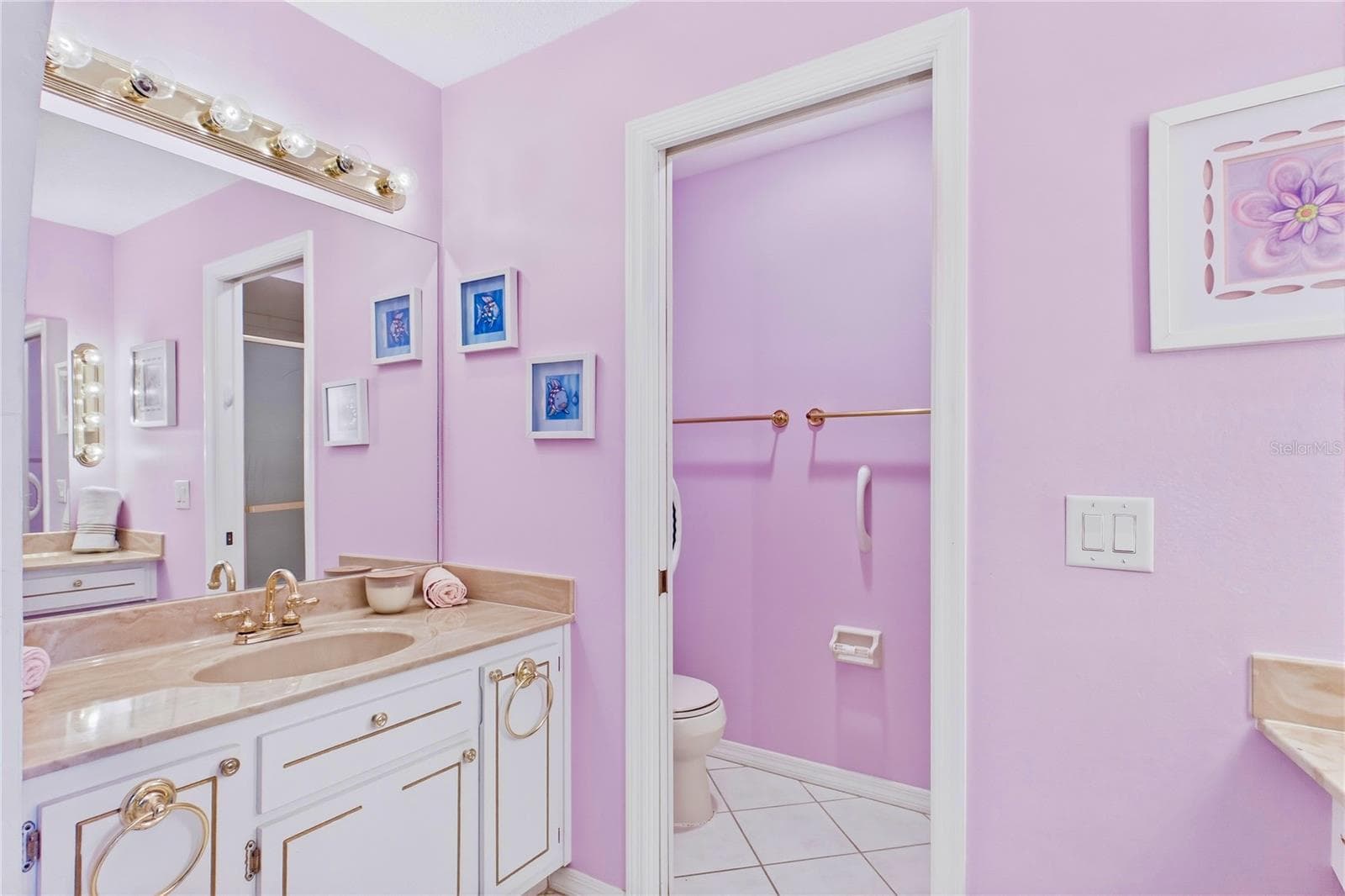 The SPACIOUS PRIMARY SUITE features a private bathroom with stand-up shower, makeup vanity and cabinetry - 4218 SE 20TH PL #D5, CAPE CORAL