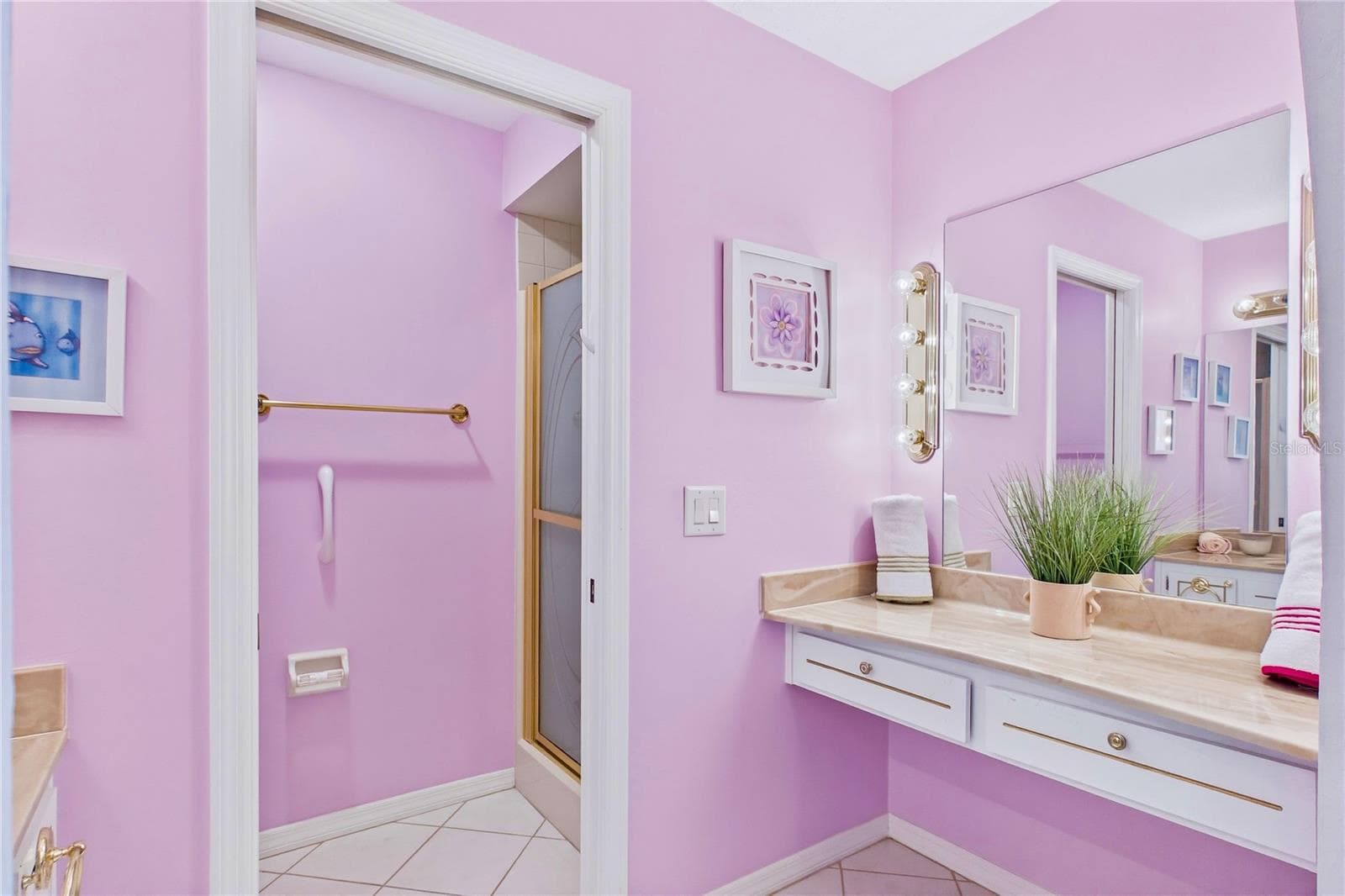 Primary bath with a large vanity and generous counter space - 4218 SE 20TH PL #D5, CAPE CORAL