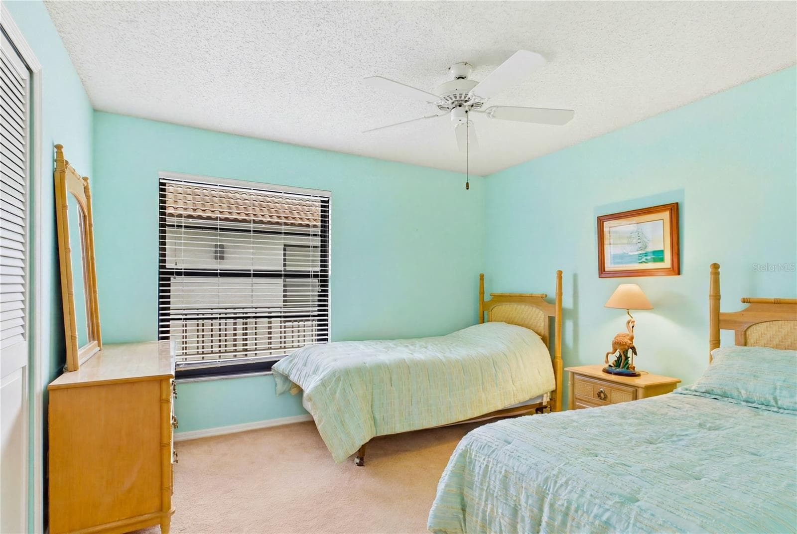 The GUEST BEDROOM is generously sized and versatile, perfect as a second bedroom, home office, or both - 4218 SE 20TH PL #D5, CAPE CORAL