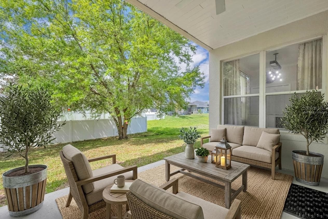Porch open to Back Yard--virtually staged - 1502 ASHDOWN CT, SANFORD