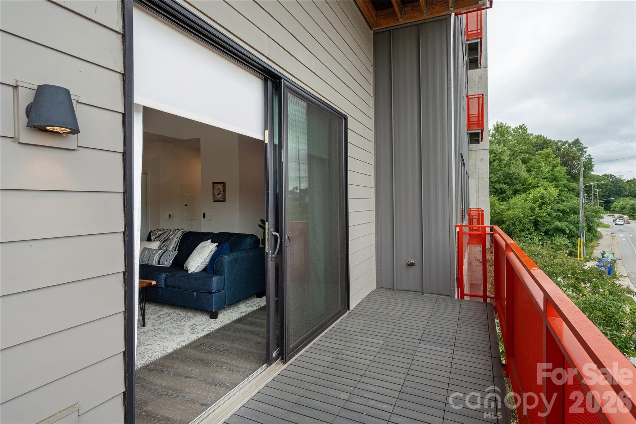Enjoy a private balcony, perfect for enjoying morning coffee or unwinding in the evening. - Asheville
