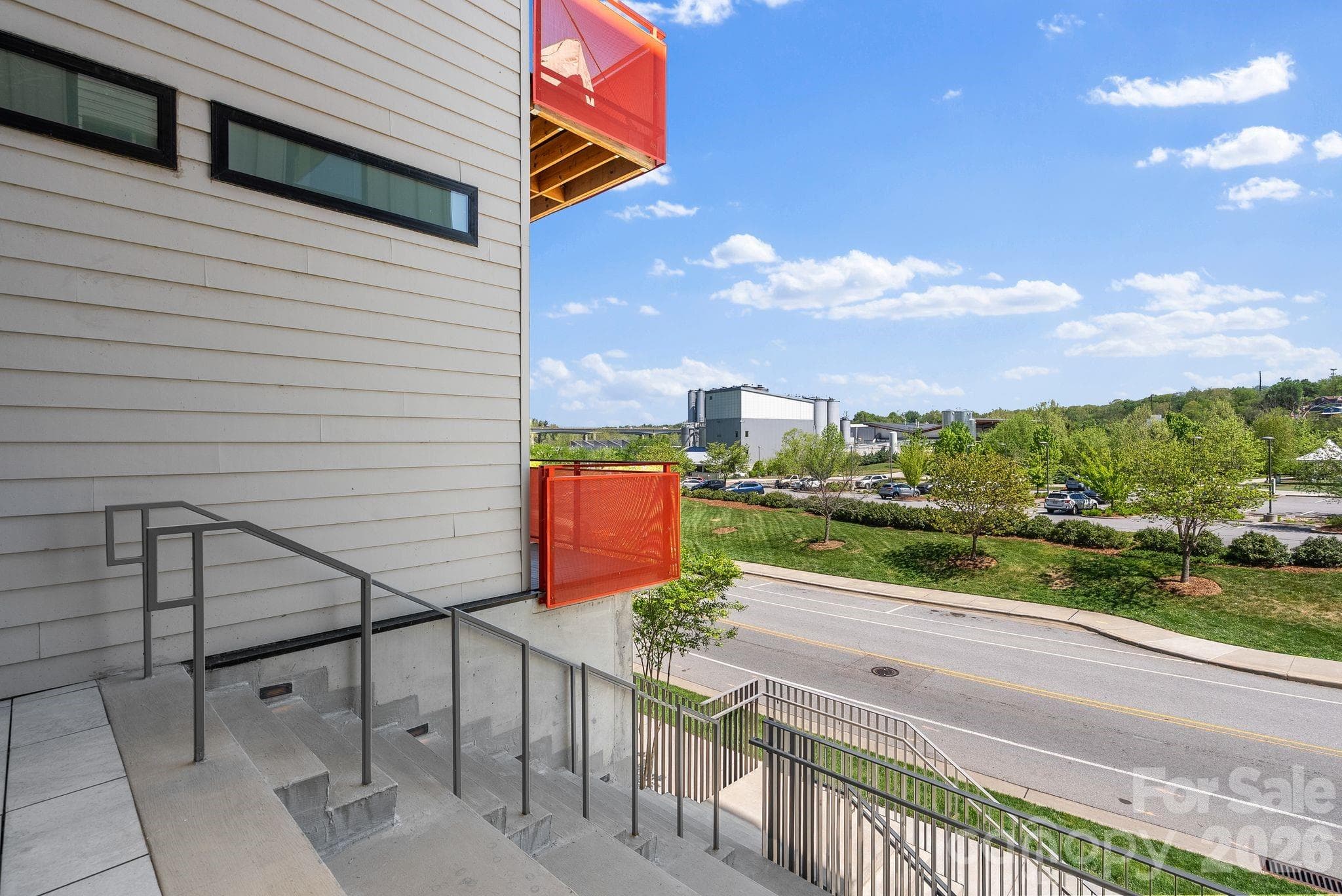 Walk across the street to New Belgium to enjoy a cold brew or access the French Broad River Greenway. - Asheville