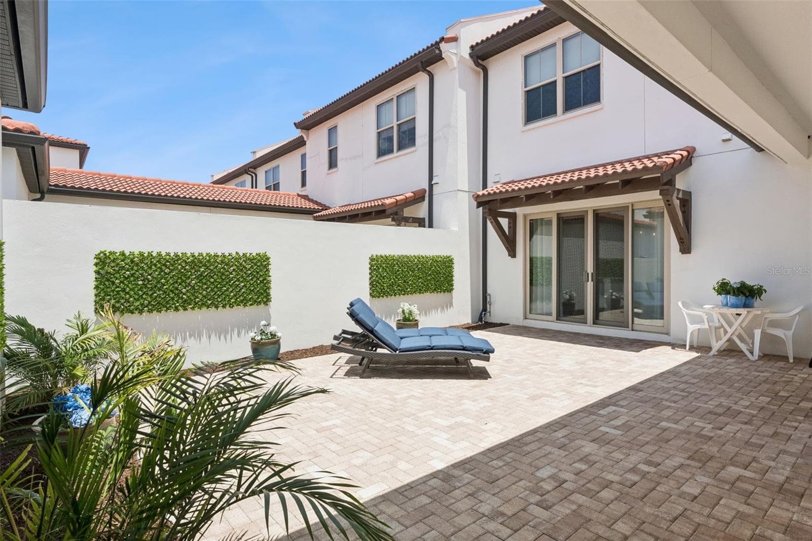 Patio from garage - 8932 BISMARCK PALM DR, WINTER GARDEN
