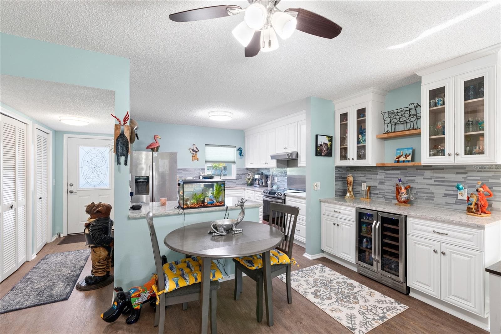 Beautiful space just outside the kitchen for storing your decorative dishes and glasses as well as enjpying a coffe bar and cocktail bar. - 2259 COSTA RICAN DR #23, CLEARWATER