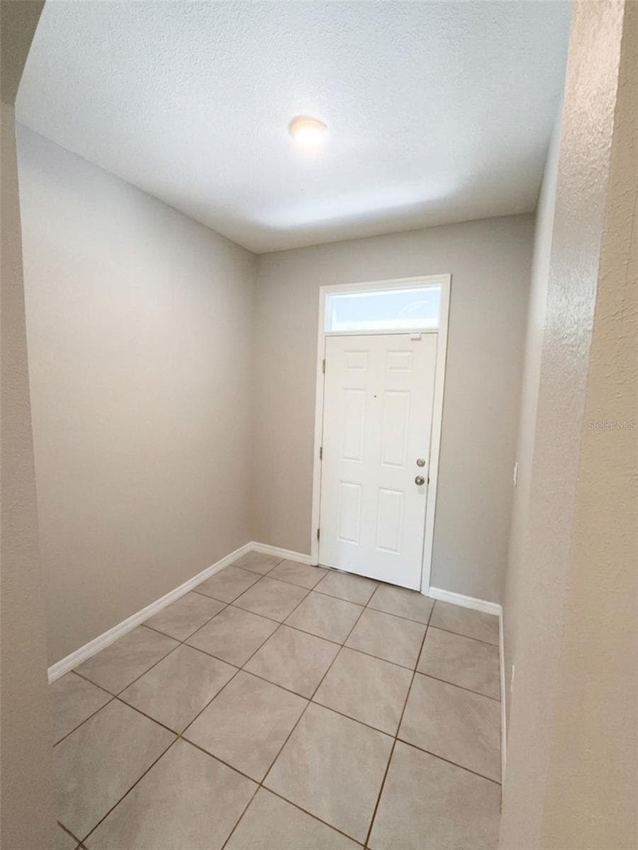 Inside entryway - 5254 DRAGONFLY DR, WILDWOOD