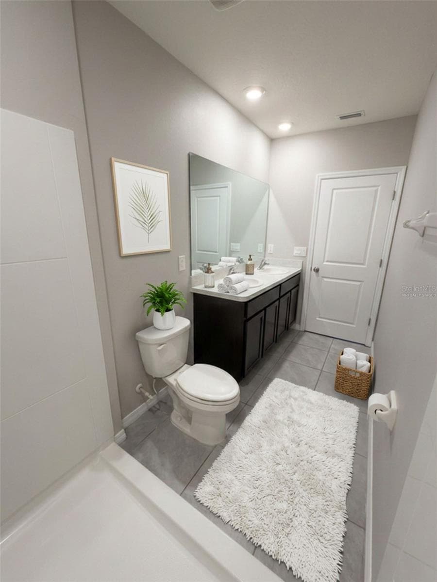 Master bathroom virtually staged - 5254 DRAGONFLY DR, WILDWOOD