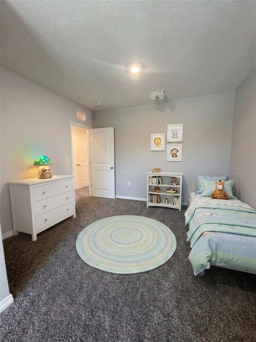 Bedroom 2 virtually staged - 5254 DRAGONFLY DR, WILDWOOD