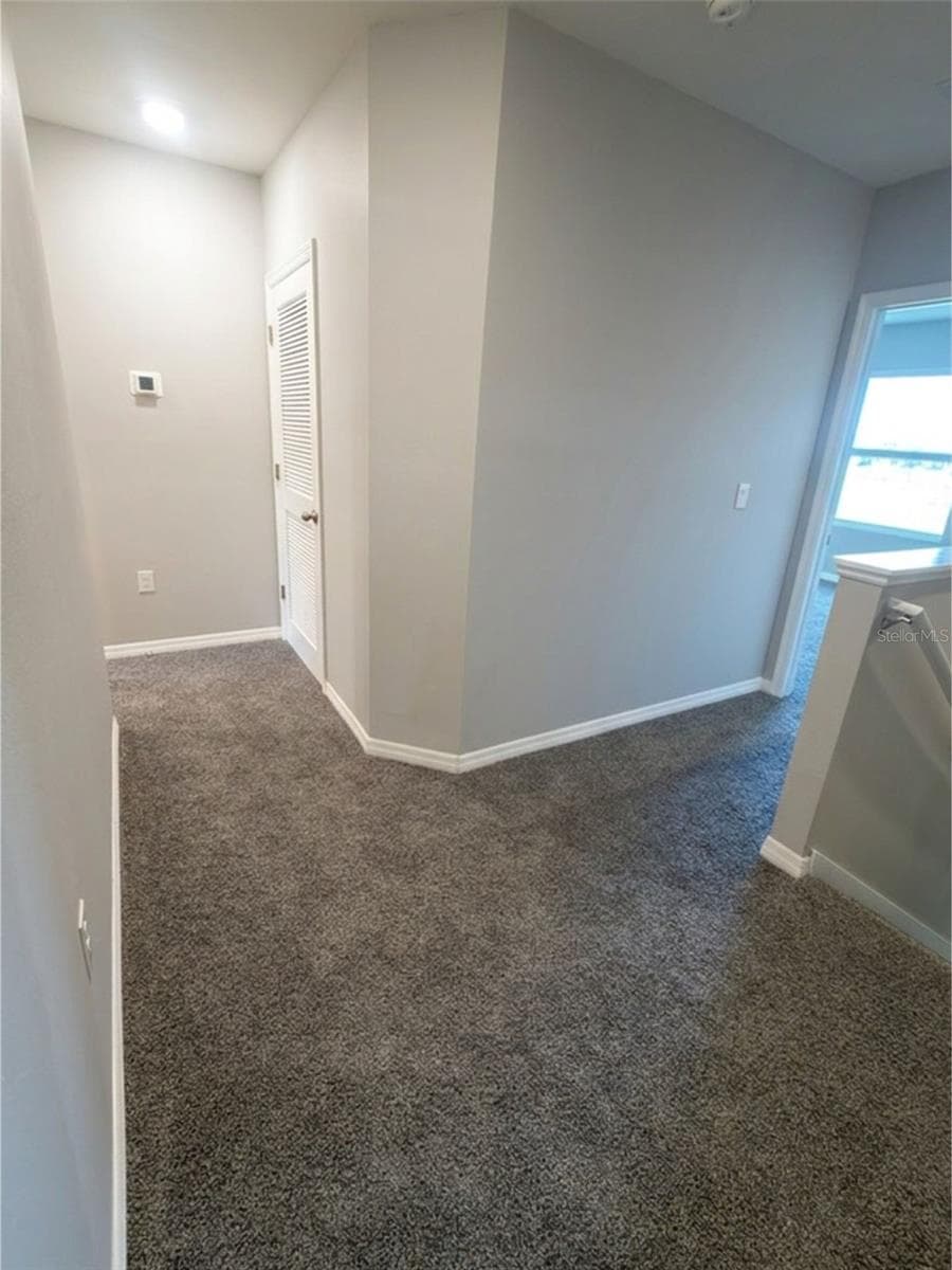 Upstairs hallway - 5254 DRAGONFLY DR, WILDWOOD