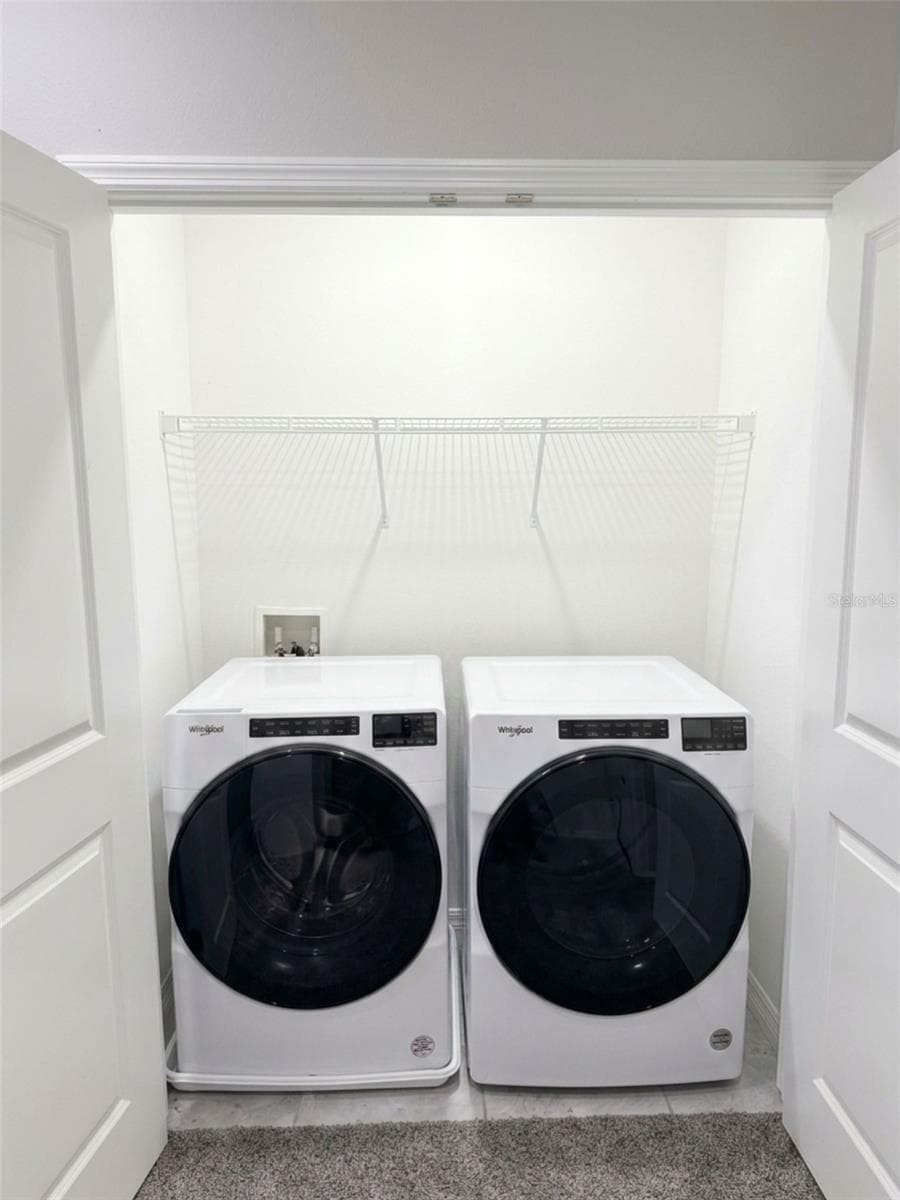 Laundry room upstairs - 5254 DRAGONFLY DR, WILDWOOD