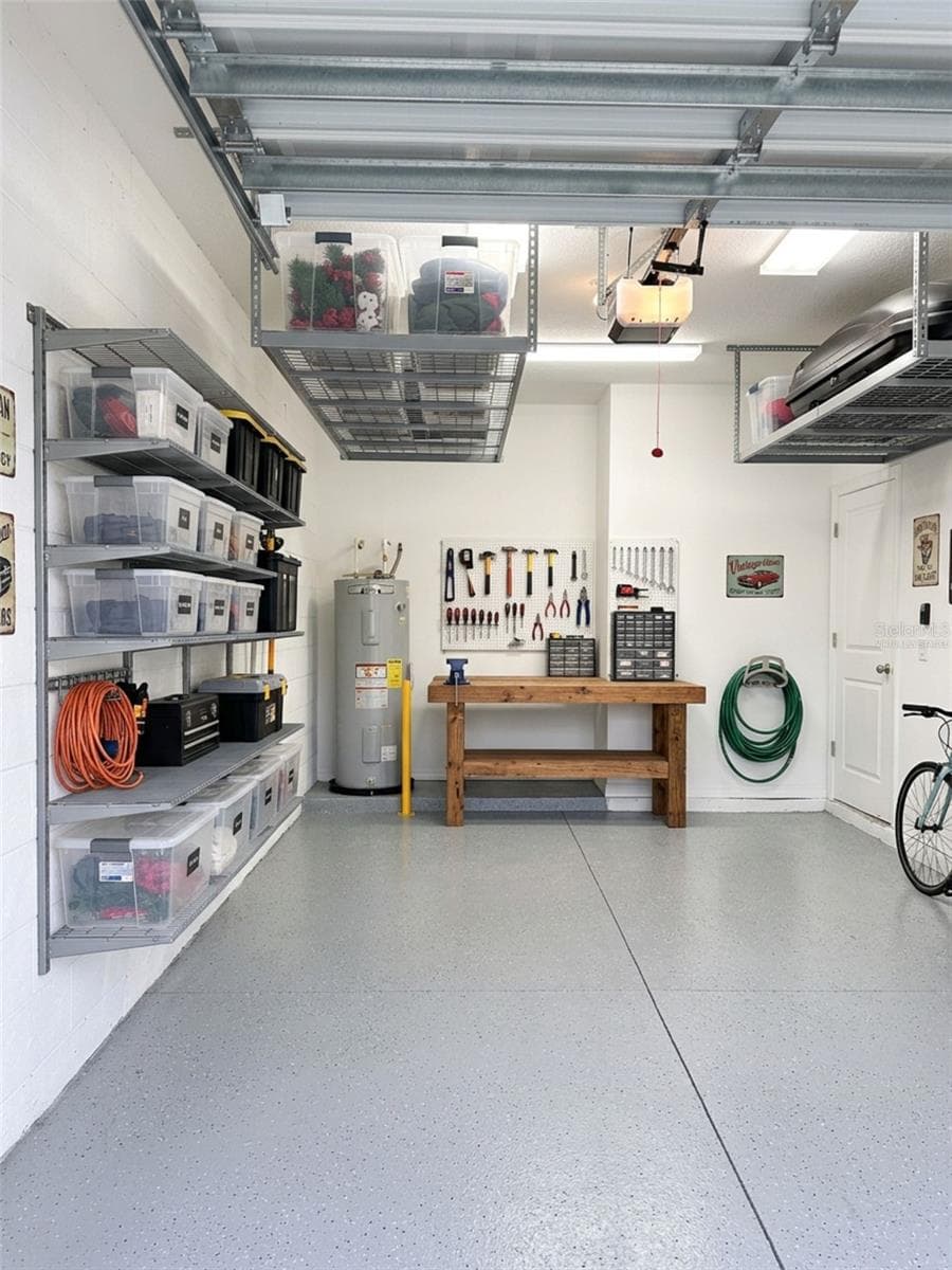 Garage virtually staged - 5254 DRAGONFLY DR, WILDWOOD