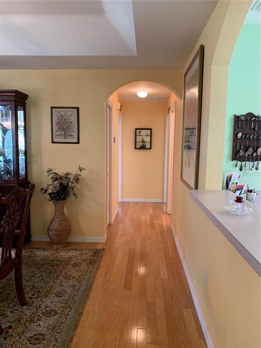Hallway to baths and bedrooms - 6369 SW 117TH LOOP, OCALA