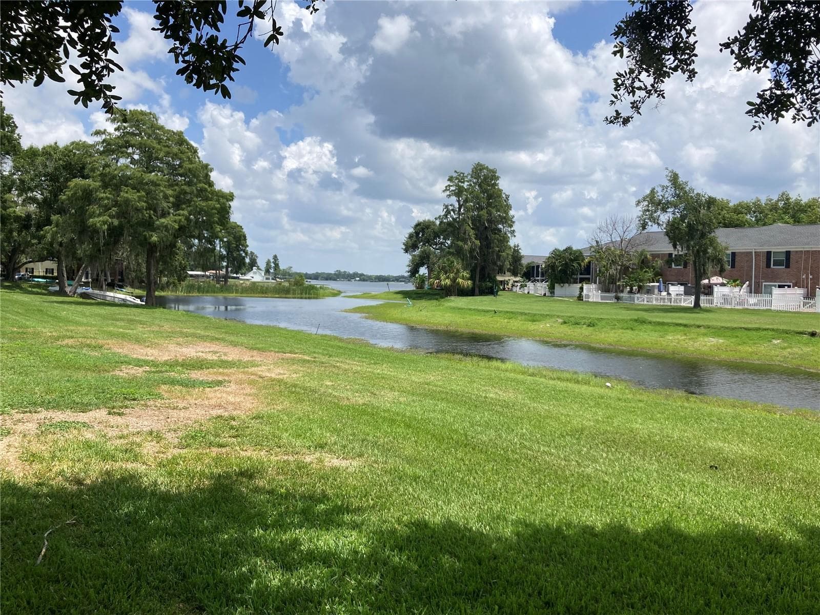 Lake view from backyard - 13709 JUNIPER BLOSSOM DR #0, TAMPA