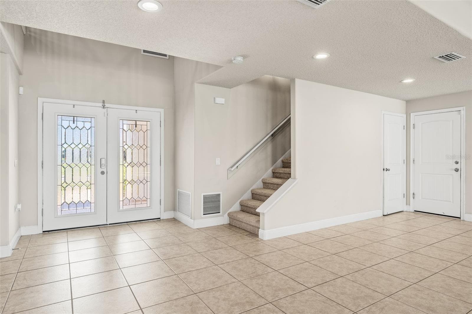 entrance stairs new carpet - 3897 PROVINCE DR, MELBOURNE
