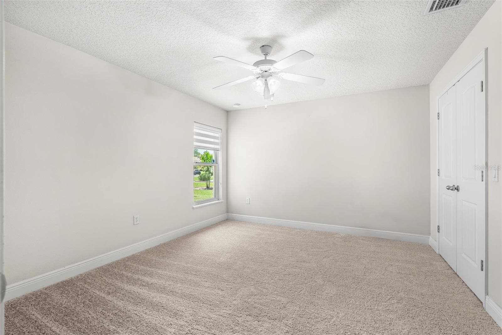 downstairs guest bedroom new carpet - 3897 PROVINCE DR, MELBOURNE