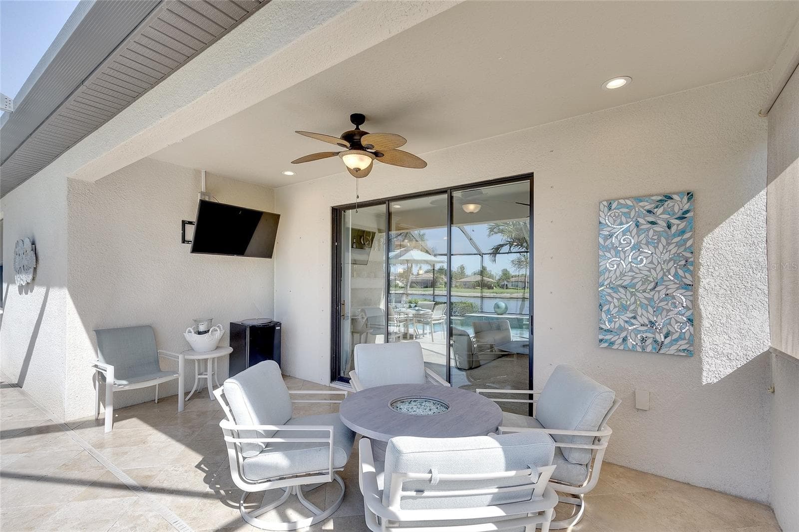 Covered Outdoor Living Area with Fire Pit Table - 7130 QUIET CREEK DR, BRADENTON