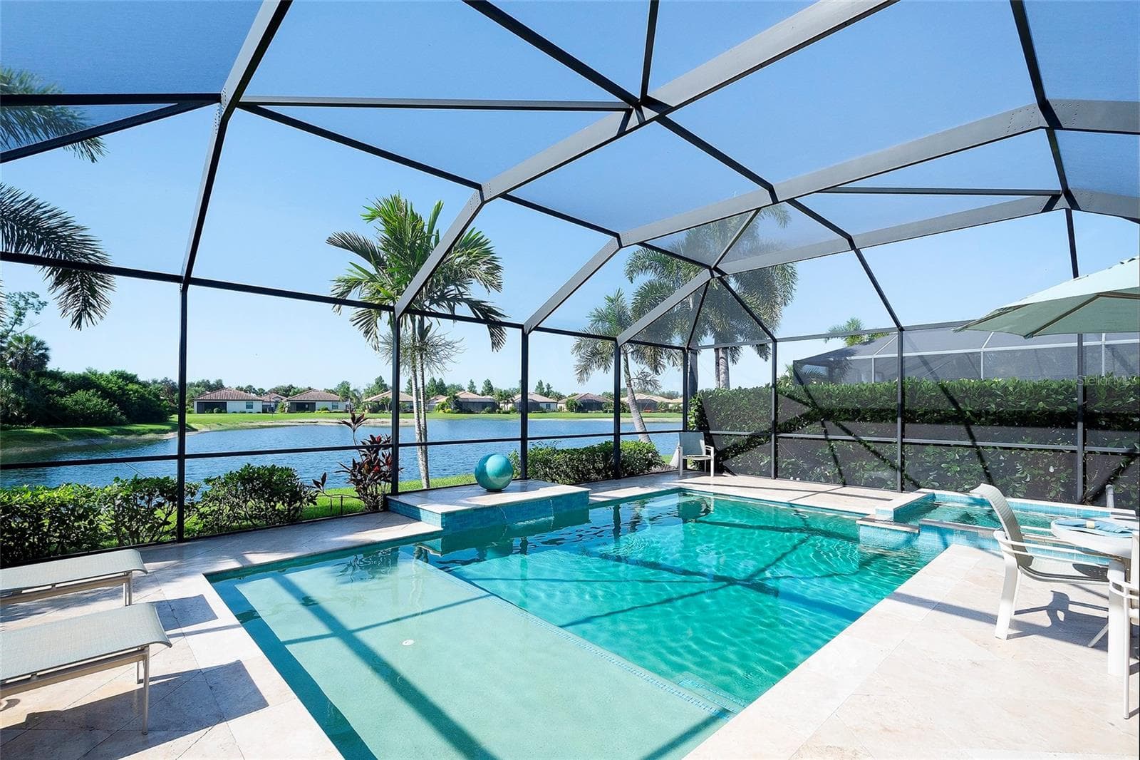 Heated Saltwater Pool & Spa with Sun Shelf - 7130 QUIET CREEK DR, BRADENTON